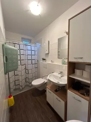Ein Badezimmer in der Unterkunft City Apartment nähe Universität