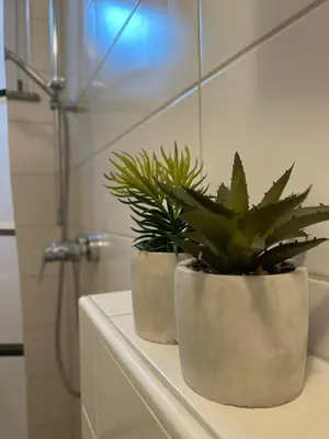 Ein Badezimmer in der Unterkunft City Apartment nähe Universität