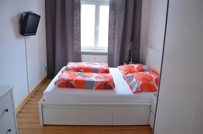 Ein Bett oder Betten in einem Zimmer der Unterkunft Ferienwohnung Barfly