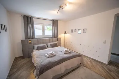 Ein Bett oder Betten in einem Zimmer der Unterkunft Charmantes Apartment in Neuwied