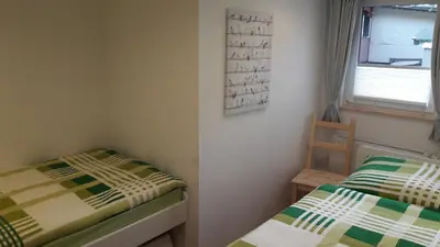 Ein Bett oder Betten in einem Zimmer der Unterkunft Ferienhaus 8