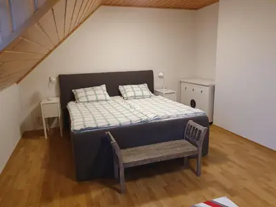Ein Bett oder Betten in einem Zimmer der Unterkunft Ferienwohnung Meuspath