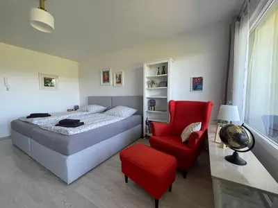 Ein Bett oder Betten in einem Zimmer der Unterkunft Loreleyblick-Ferienwohnung am Rheinsteig - Natur und Aussicht