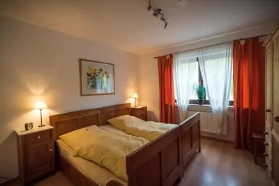 Ein Bett oder Betten in einem Zimmer der Unterkunft Weingut Peifer