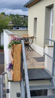 Ein Balkon oder eine Terrasse in der Unterkunft Ferienwohnung Am Gäsbach OG