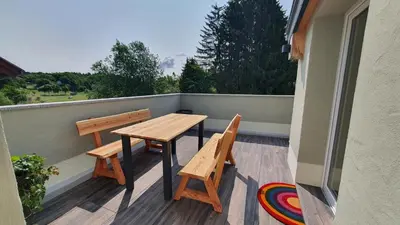 Ein Balkon oder eine Terrasse in der Unterkunft Ferienwohnung Am Gäsbach OG