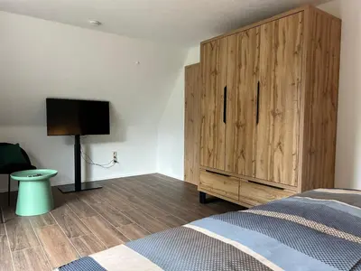 Ein Bett oder Betten in einem Zimmer der Unterkunft Ferienwohnung Hafenblick
