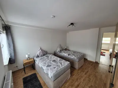 Ein Bett oder Betten in einem Zimmer der Unterkunft Gemütliches Dachapartment
