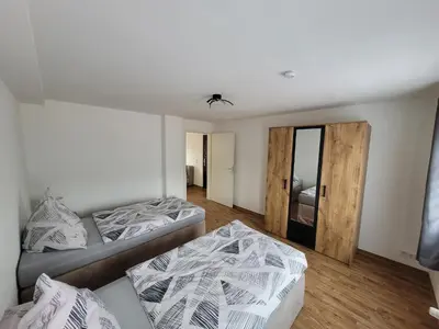 Ein Bett oder Betten in einem Zimmer der Unterkunft Gemütliches Dachapartment
