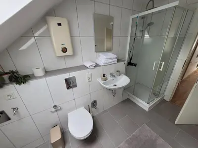 Ein Badezimmer in der Unterkunft Gemütliches Dachapartment