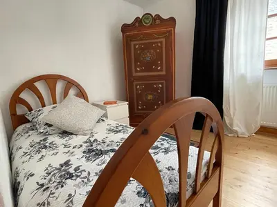 Ein Bett oder Betten in einem Zimmer der Unterkunft Ehemaliges Wein Chateau