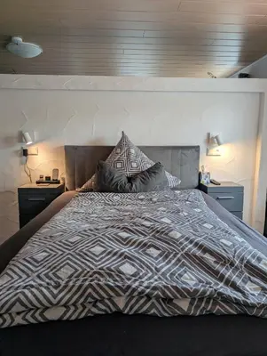 Ein Bett oder Betten in einem Zimmer der Unterkunft Ferienhaus An der Quell