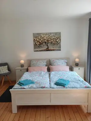 Ein Bett oder Betten in einem Zimmer der Unterkunft Fewo Glanblick
