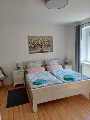 Ein Bett oder Betten in einem Zimmer der Unterkunft Fewo Glanblick