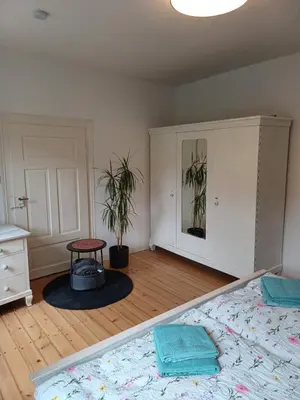 Ein Bett oder Betten in einem Zimmer der Unterkunft Fewo Glanblick