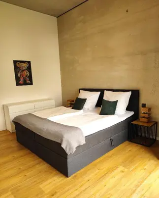 Ein Bett oder Betten in einem Zimmer der Unterkunft Tiny Loft Hunsrück