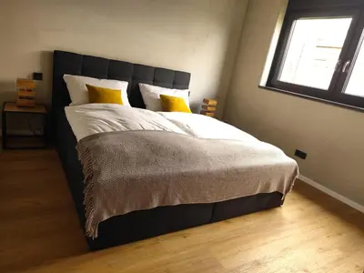 Ein Bett oder Betten in einem Zimmer der Unterkunft Tiny Loft Hunsrück
