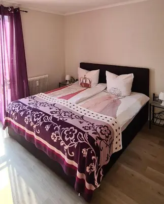 Ein Bett oder Betten in einem Zimmer der Unterkunft Apartment Koblenz naehe Altstadt