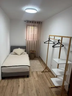 Ein Bett oder Betten in einem Zimmer der Unterkunft Cozy apartment