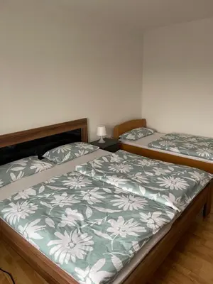 Ein Bett oder Betten in einem Zimmer der Unterkunft FeWo Centrum Daun