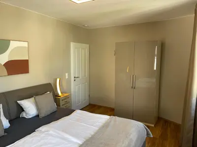 Ein Bett oder Betten in einem Zimmer der Unterkunft Mosel-Wohnen II - FERIENLAND COCHEM - Ellenz-Poltersdorf