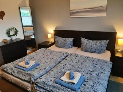 Ein Bett oder Betten in einem Zimmer der Unterkunft Ferienwohnung maareemonti