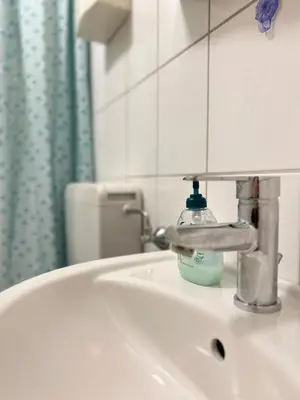 Ein Badezimmer in der Unterkunft City Apartment Nähe Uni mit Parkplatz