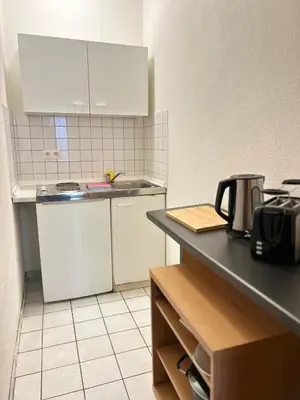Küche/Küchenzeile in der Unterkunft City Apartment Nähe Uni mit Parkplatz