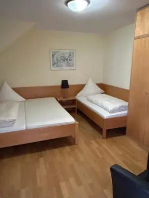 Ein Bett oder Betten in einem Zimmer der Unterkunft Hotel-Restaurant Jägerhof