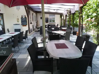 Ein Restaurant oder anderes Speiselokal in der Unterkunft Moselperle Hotel Restaurant