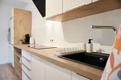 Küche/Küchenzeile in der Unterkunft Stylisches City Apartment mit Terrasse für max 4 Personen in nähe zum HBF Koblenz und Koblenzer-Innenstadt