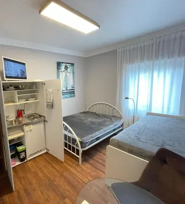 Ein Bett oder Betten in einem Zimmer der Unterkunft Ferienwohnung-Oberstein im Zentrum