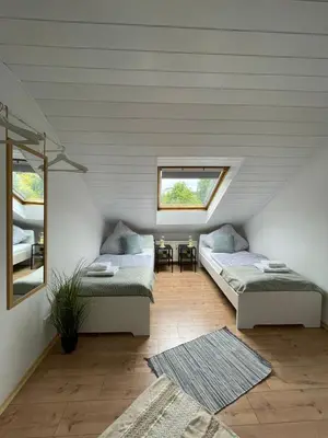 Ein Bett oder Betten in einem Zimmer der Unterkunft Charmante Dachgeschosswohnung bis zu 6 Gäste