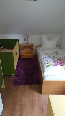 Ein Bett oder Betten in einem Zimmer der Unterkunft Eifel-FeWo by Eva Kröll