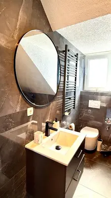 Ein Badezimmer in der Unterkunft Suite Toni