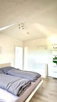 Ein Bett oder Betten in einem Zimmer der Unterkunft Suite Toni