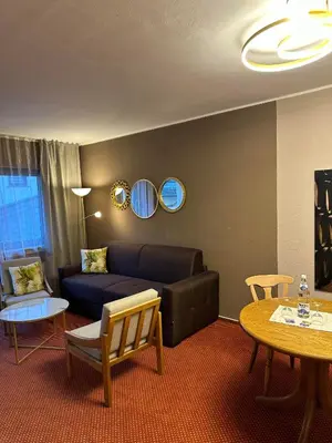 Ein Sitzbereich in der Unterkunft Lesura Ferien- Apartment