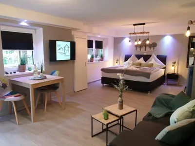 Ein Bett oder Betten in einem Zimmer der Unterkunft Eifel Dream Krausbuche