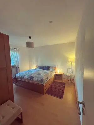 Ein Bett oder Betten in einem Zimmer der Unterkunft Fewo Storchenschnabel