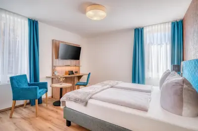 Ein Bett oder Betten in einem Zimmer der Unterkunft Haus Moselfranke