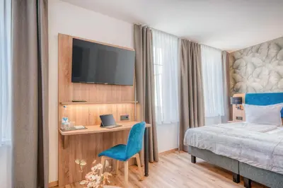 Ein Bett oder Betten in einem Zimmer der Unterkunft Haus Moselfranke