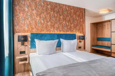 Ein Bett oder Betten in einem Zimmer der Unterkunft Haus Moselfranke