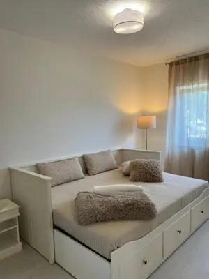 Ein Bett oder Betten in einem Zimmer der Unterkunft Ferienwohnung Hügel Blick