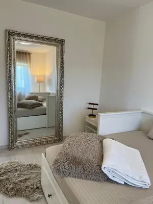 Ein Bett oder Betten in einem Zimmer der Unterkunft Ferienwohnung Hügel Blick