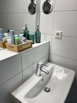 Ein Badezimmer in der Unterkunft Apartment mit Stadtblick