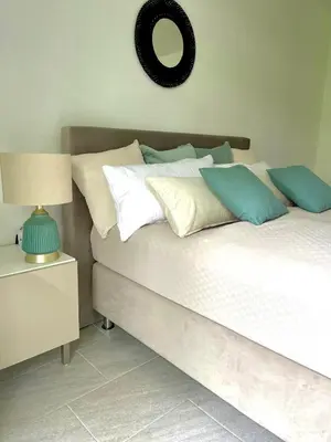 Ein Bett oder Betten in einem Zimmer der Unterkunft Apartment mit Stadtblick