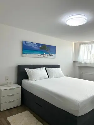 Ein Bett oder Betten in einem Zimmer der Unterkunft Ferienwohnung in Gerolstein Zentrum 2
