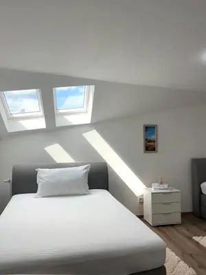 Ein Bett oder Betten in einem Zimmer der Unterkunft Ferienwohnung in Gerolstein Zentrum 2