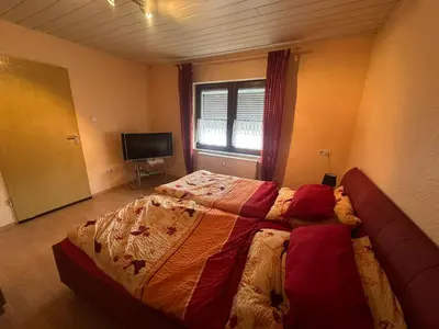 Ein Bett oder Betten in einem Zimmer der Unterkunft Fewo Apartment Neuwied