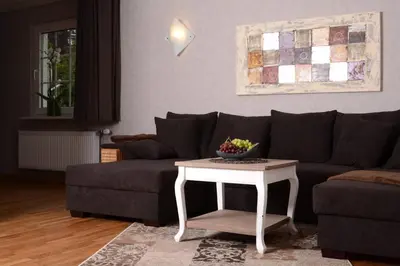 Ein Sitzbereich in der Unterkunft Wellness-Ferienwohnung-EifelErnstbergblick 1
